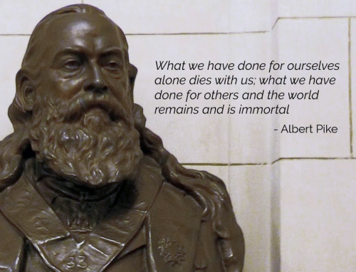 Bronze bust of Albert Pike with quote that reads What we have done for ourselves dies with us, what we have done for others and the world remains and is immortal